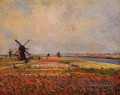 Champs de fleurs et moulins à vent près de Leiden Claude Monet paysage